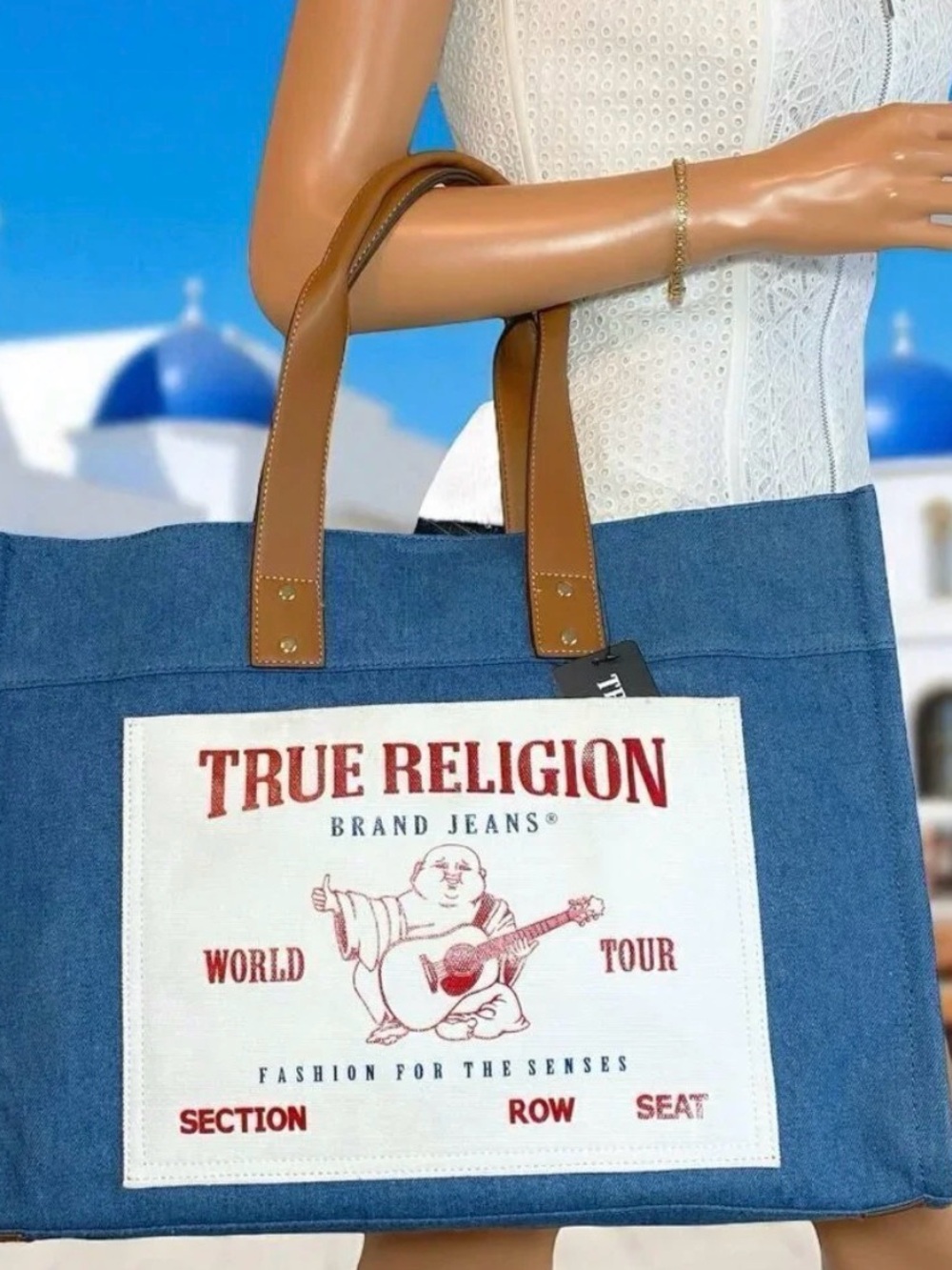 True Religion Denim Tote with Brown Leather Handles and Red Logo Patch